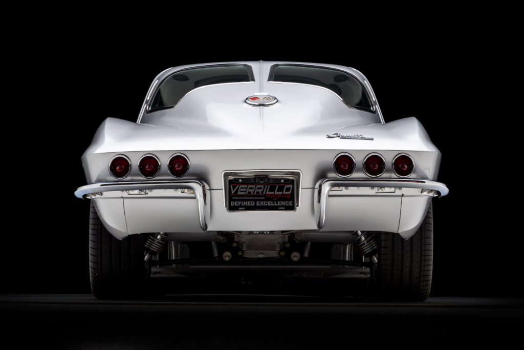 Rear view of a 1963 Split-Window Corvette custom coupe restomod in Silver Pearl built by Verrillo Motor Car Co.