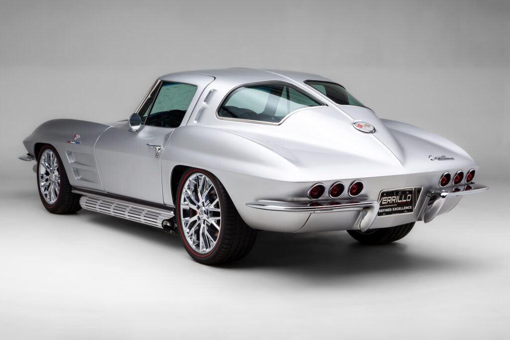Rear side view of a 1963 Split-Window Corvette custom coupe restomod in Silver Pearl built by Verrillo Motor Car Co.