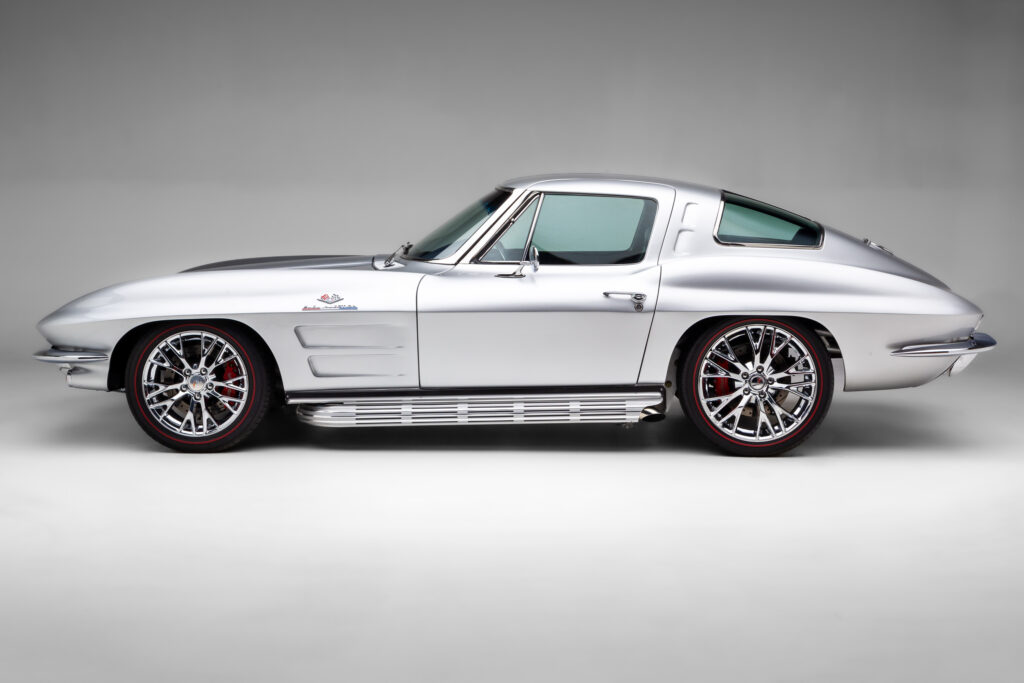 Side profile of a 1963 Split-Window Corvette custom coupe restomod in Silver Pearl built by Verrillo Motor Car Co.