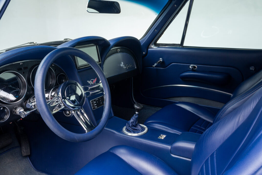Detail of the custom blue leather interior of a 1963 Split-Window Corvette custom coupe restomod built by Verrillo Motor Car Co.